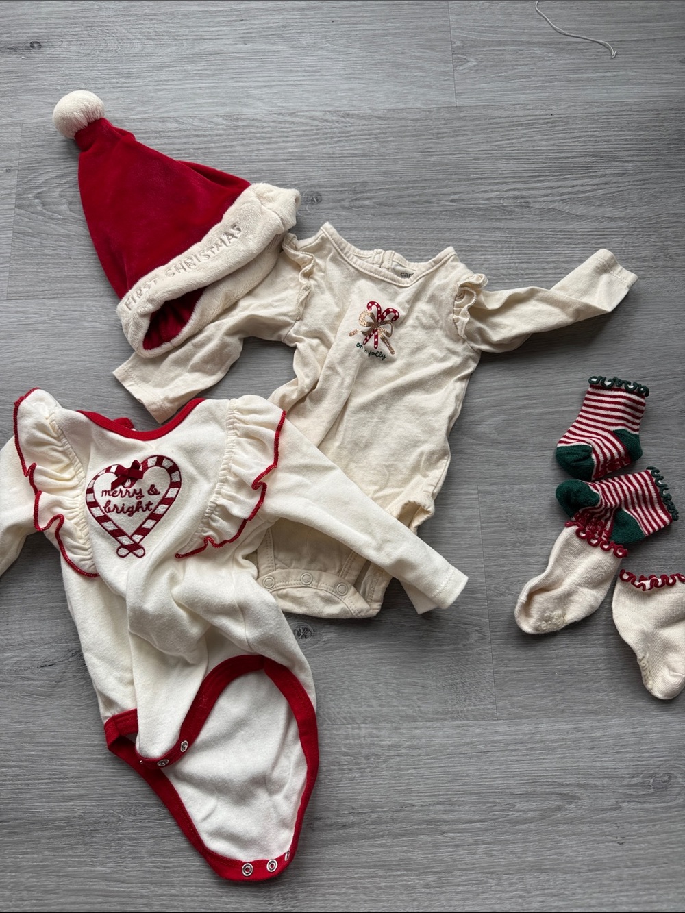 Kids Cream and Red Holiday One-Piece Bodysuit - Festive Candy Cane Design